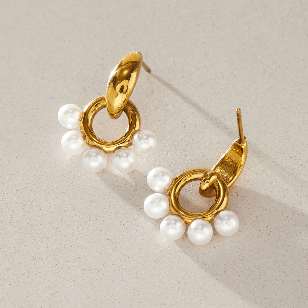 Front and back of resin pearl doorknocker earrings