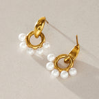 Front and back of resin pearl doorknocker earrings