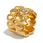 gold plated pebble band ring with organic overlapping forms
