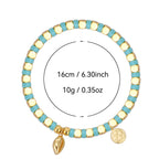 cowrie bead bracelet with supplier-listed 16 cm size and 10 g weight