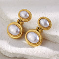 gold plated double imitation pearl drop earrings on white stone