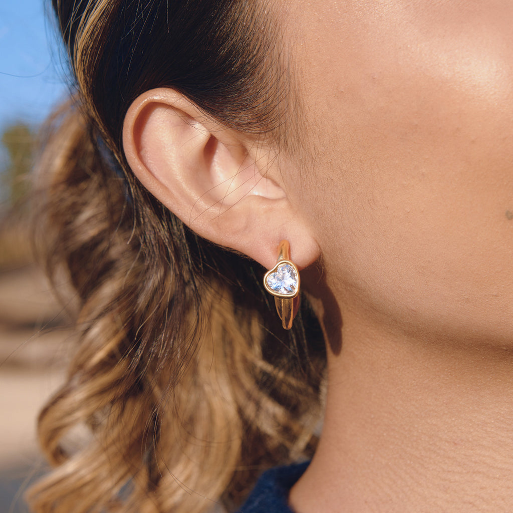 Clear heart accent stainless steel hoops shown from the side