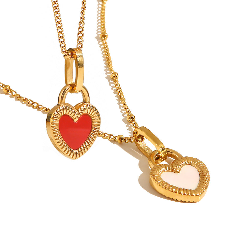 Red and white heart necklaces shown for comparison, not included