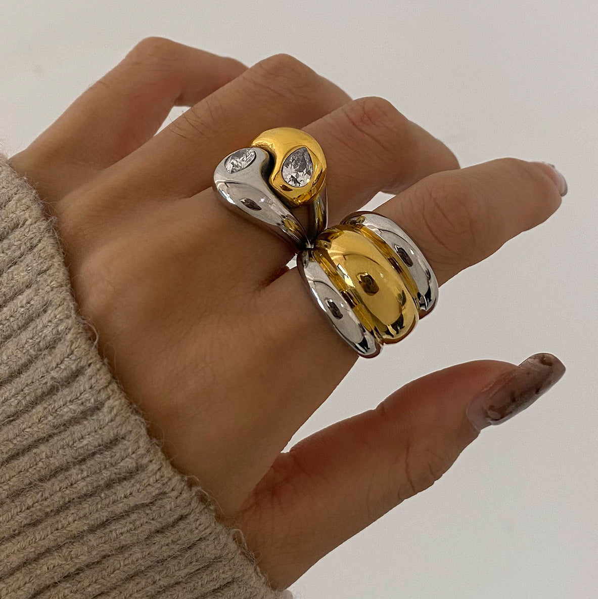 Two-Tone Stainless Steel Sculptural Ring Collection — front view