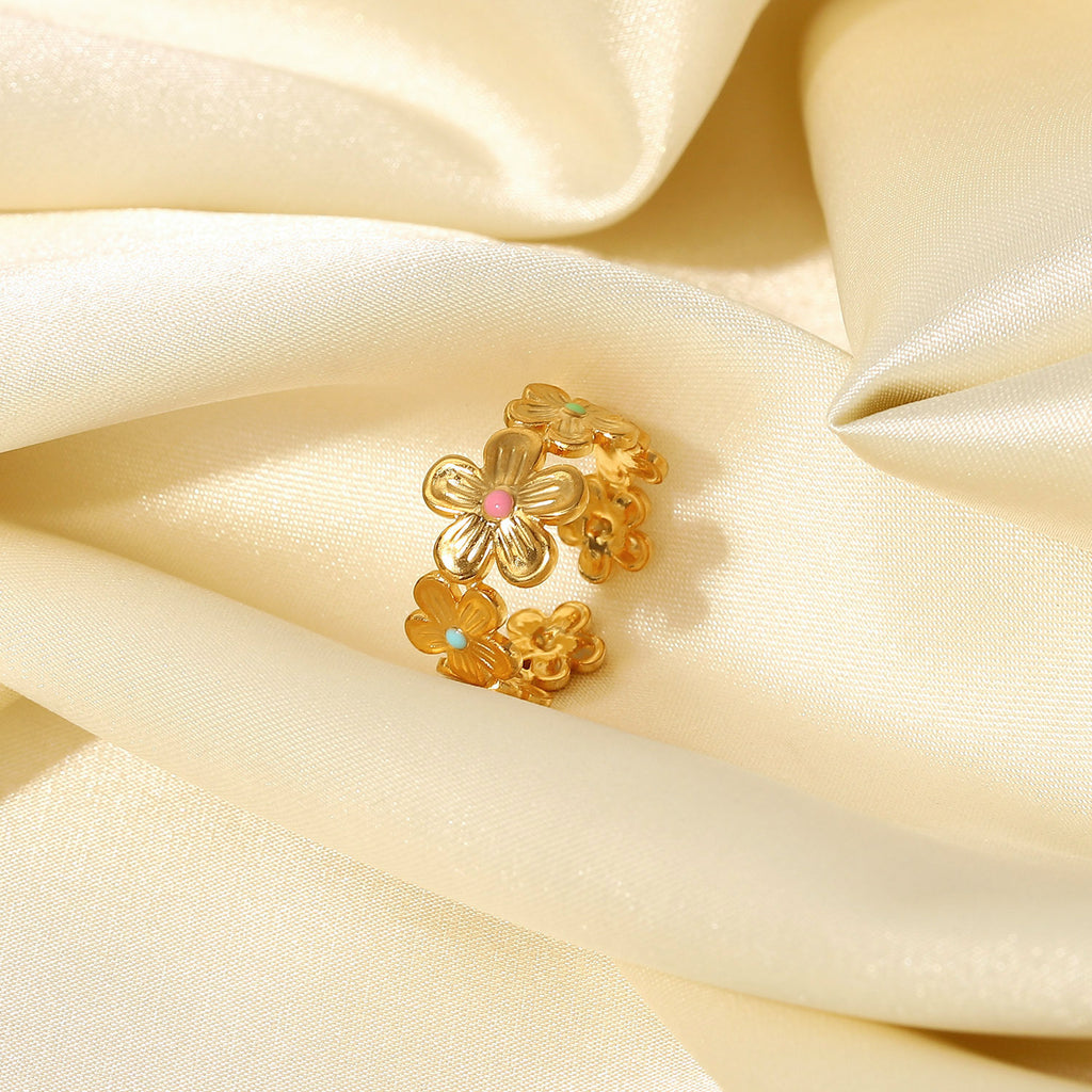 Angled view of the repeating gold plated blossoms