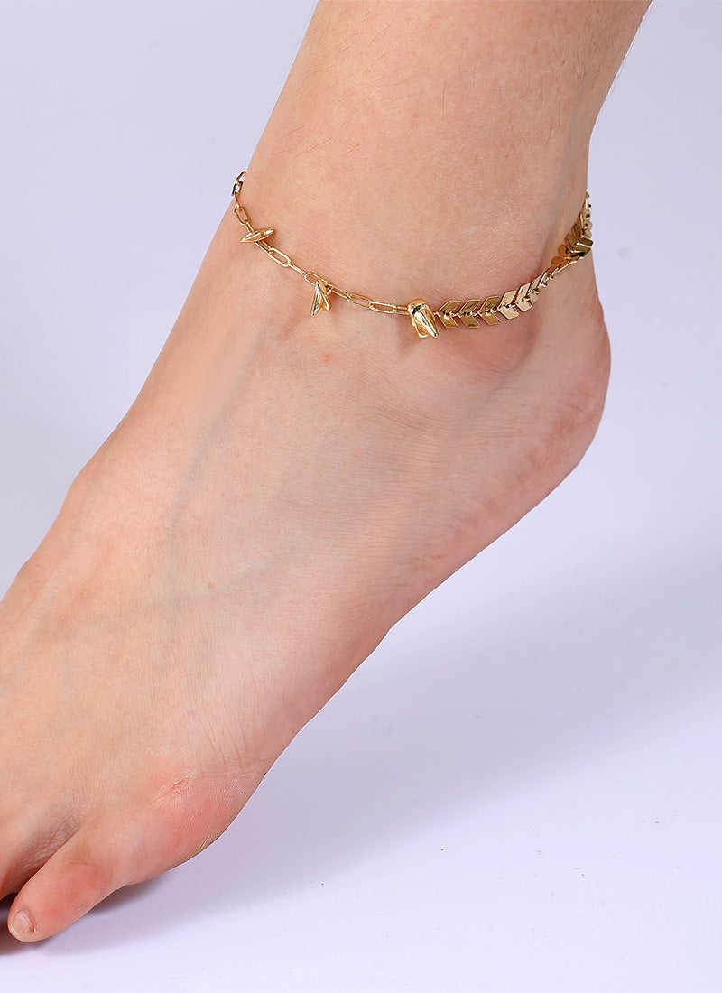 front ankle view of the gold plated spike charm anklet