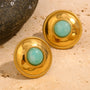 gold plated amazonite medallion stud earrings on stone