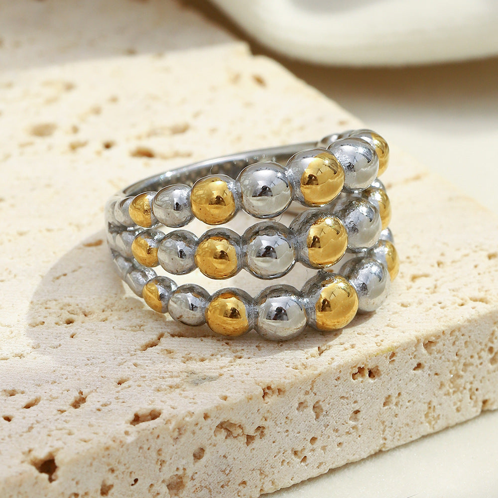 two-tone stainless steel ring with three rows of polished beads