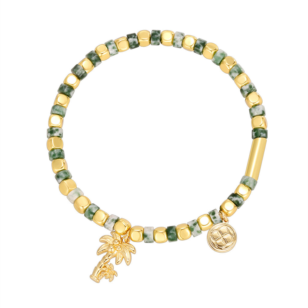 isolated full view of the green ivory and gold plated beaded bracelet