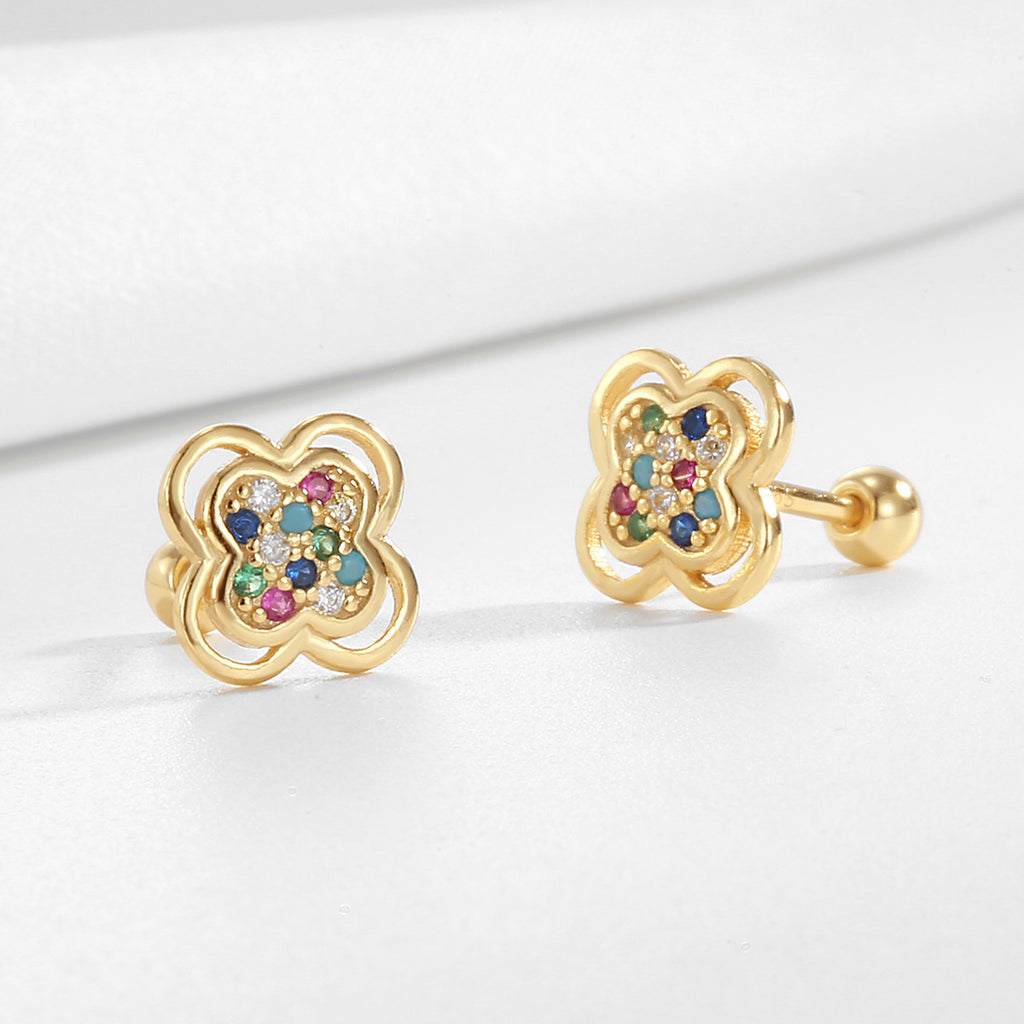 close view of gold plated clover studs and ball backs