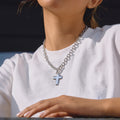 silver-finish cross toggle chain necklace worn on model