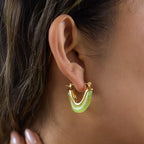 Green U-shaped resin hoop on a lobe