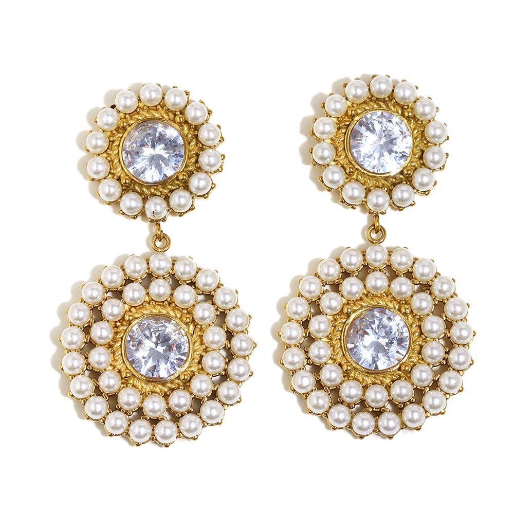 isolated front view of round pearl halo zirconia earrings