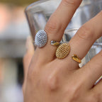 Close-up of domed mesh faces and smooth open tips