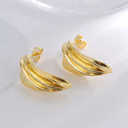 curved overlapping petal earrings in an angled product view