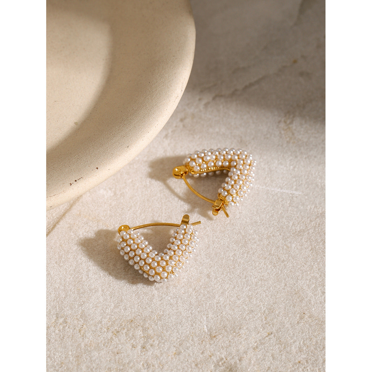 Gold-Tone Pearl-Look Clear Accent Stainless Steel Hoop Earrings shown on model
