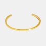 isolated gold plated brass angular open bangle