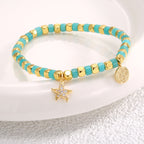 angled view of the gold plated starfish beaded bracelet