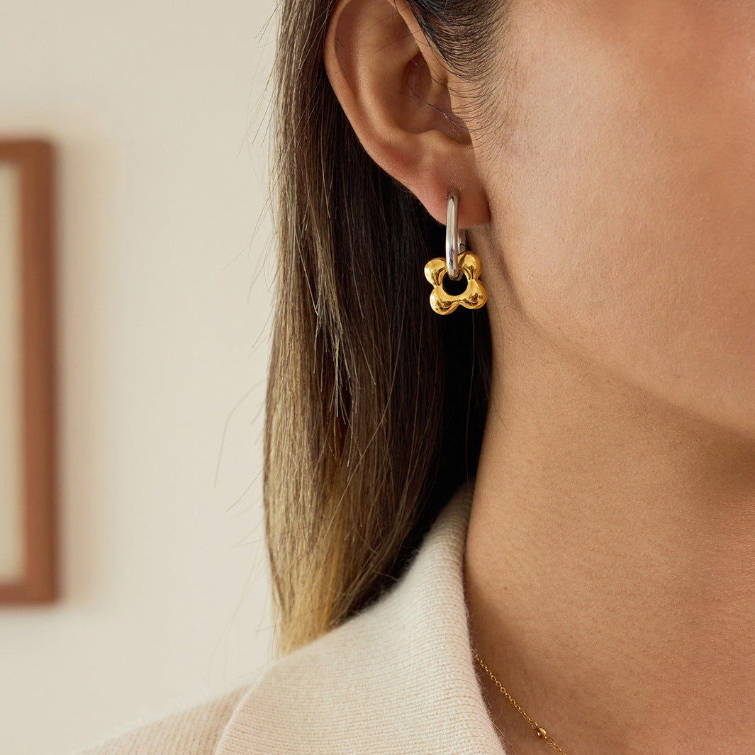 Two-Tone Floral Charm Stainless Steel Huggie Earrings — side view showing the rectangular hoop