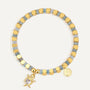 gold plated sea turtle bracelet with blue-gray cube beads