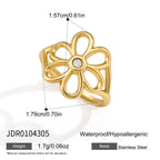 Open outline flower ring with a small clear center