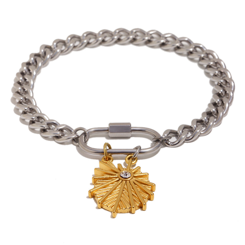 Two-tone stainless steel charm bracelet on white