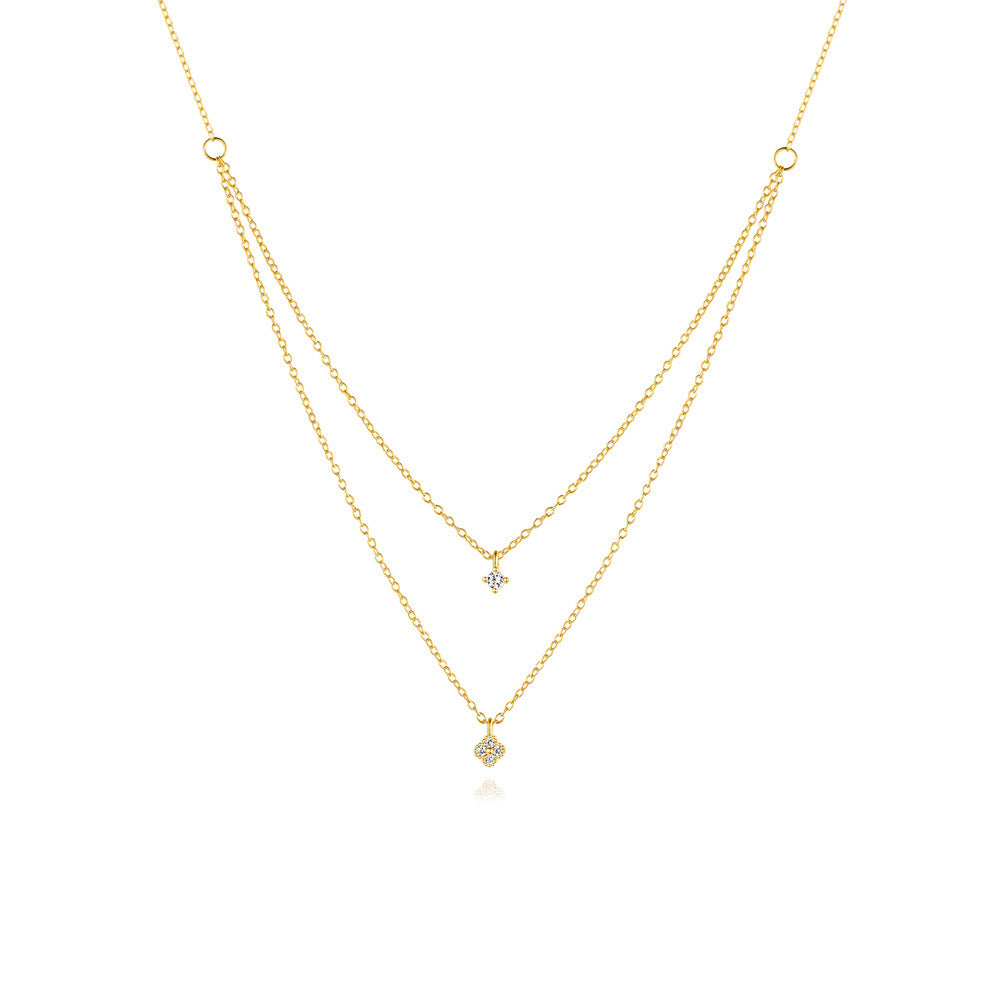 gold plated 925 silver layered necklace with two clear zirconia clovers