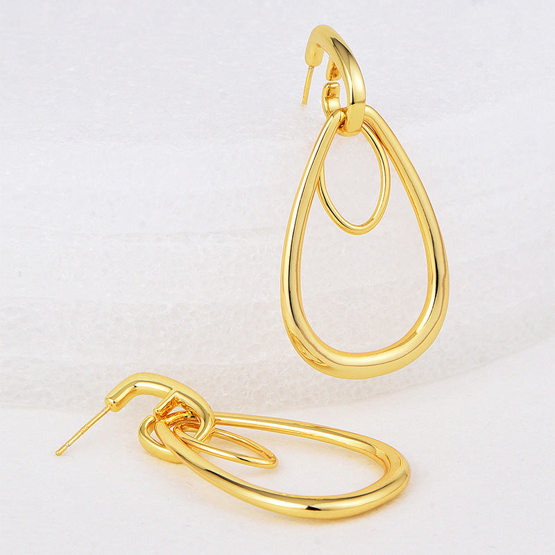 nested open teardrop earrings shown upright and lying flat
