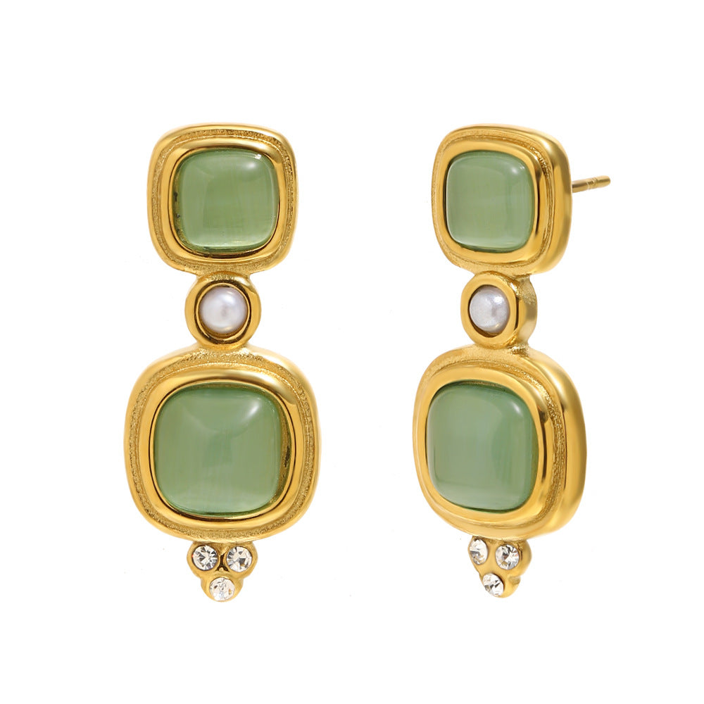 alternate front and three-quarter view of green cabochon earrings