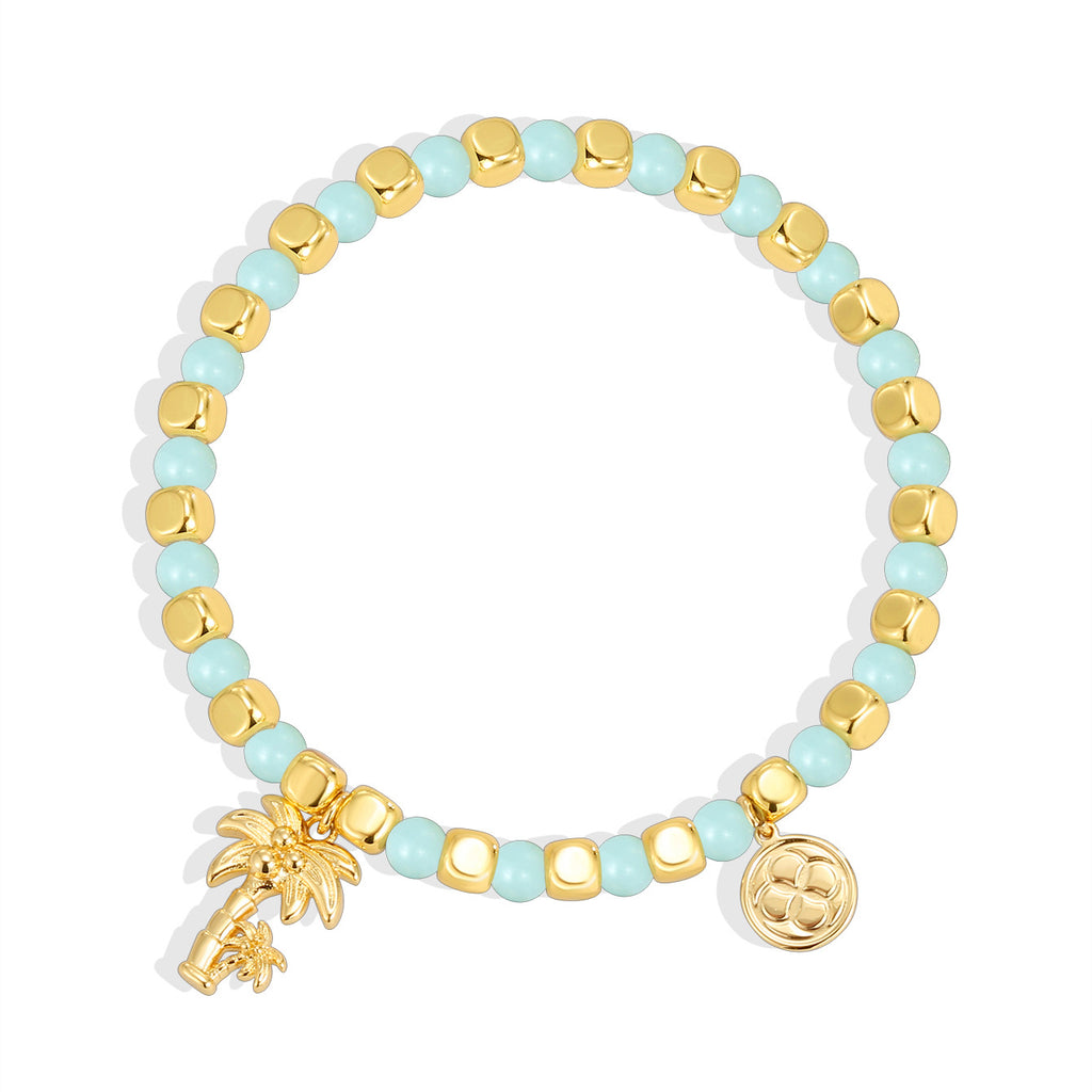 gold plated palm tree bracelet with aqua cube beads