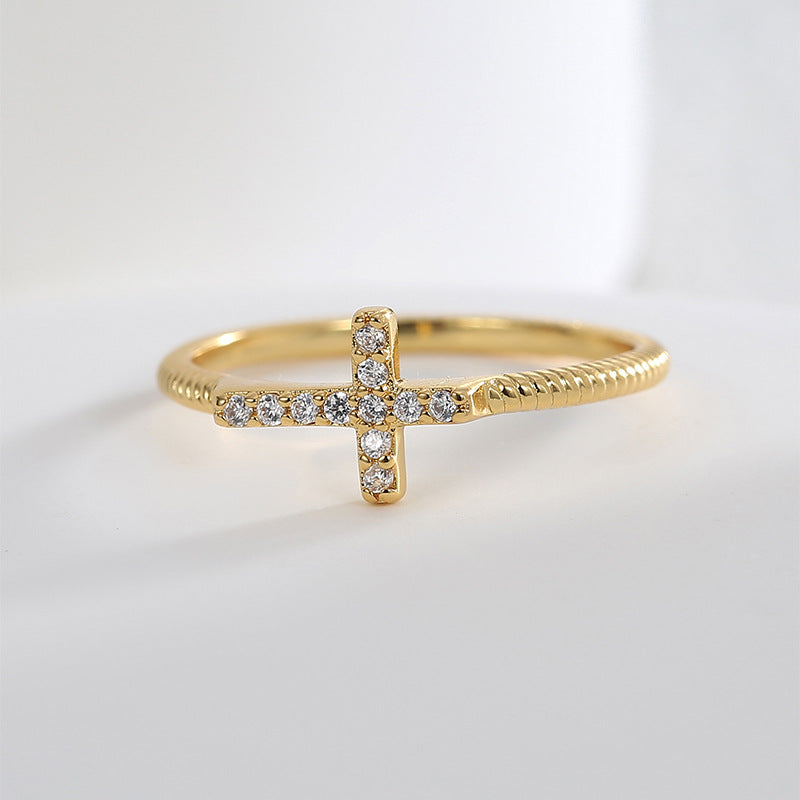 close-up of clear zirconia cross ring