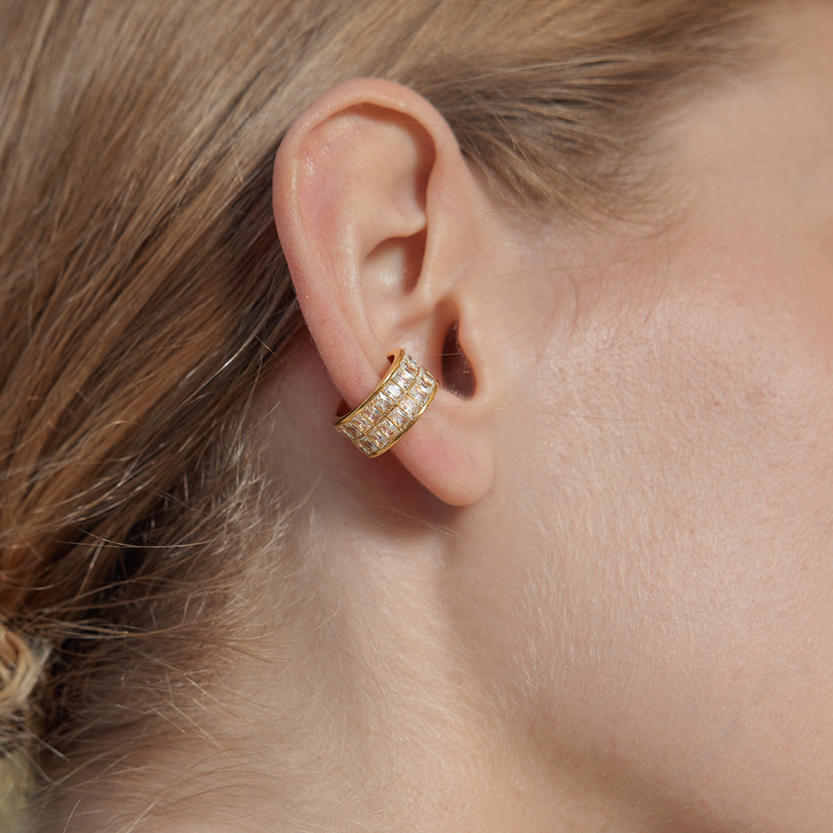 Double-row clear-stone cuff worn around the ear
