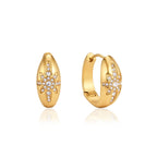 Pair of gold-tone starburst hoops against white