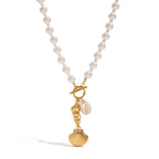 Full bead necklace with three coastal charms