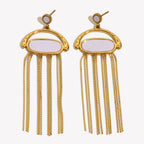 stainless steel shell earrings with long gold plated chain fringe on white