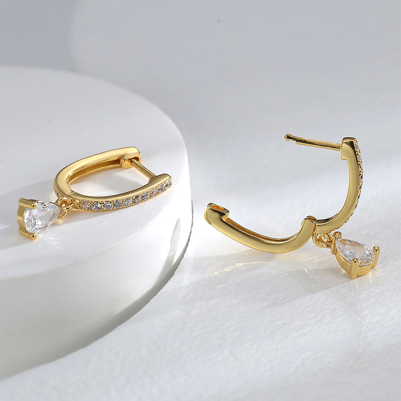 gold plated huggie drop earrings with pear-cut clear stone