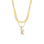 Imitation pearl letter K pendant on layered stainless steel chains