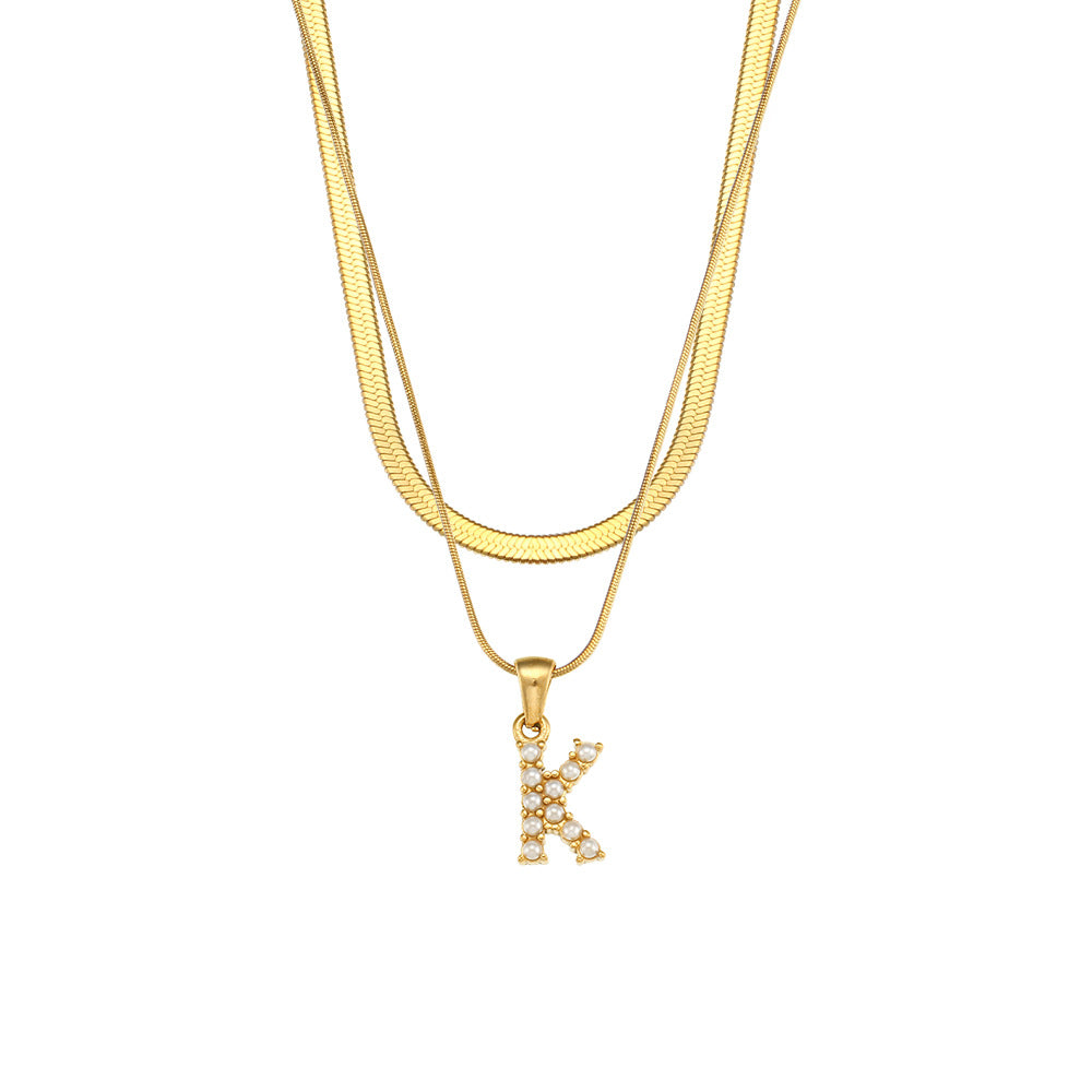 Imitation pearl letter K pendant on layered stainless steel chains