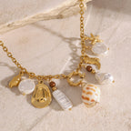 Gold-Tone Stainless Steel Ocean Charm Necklace — styled view