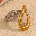 two-tone stainless steel open ring with overlapping teardrop ends