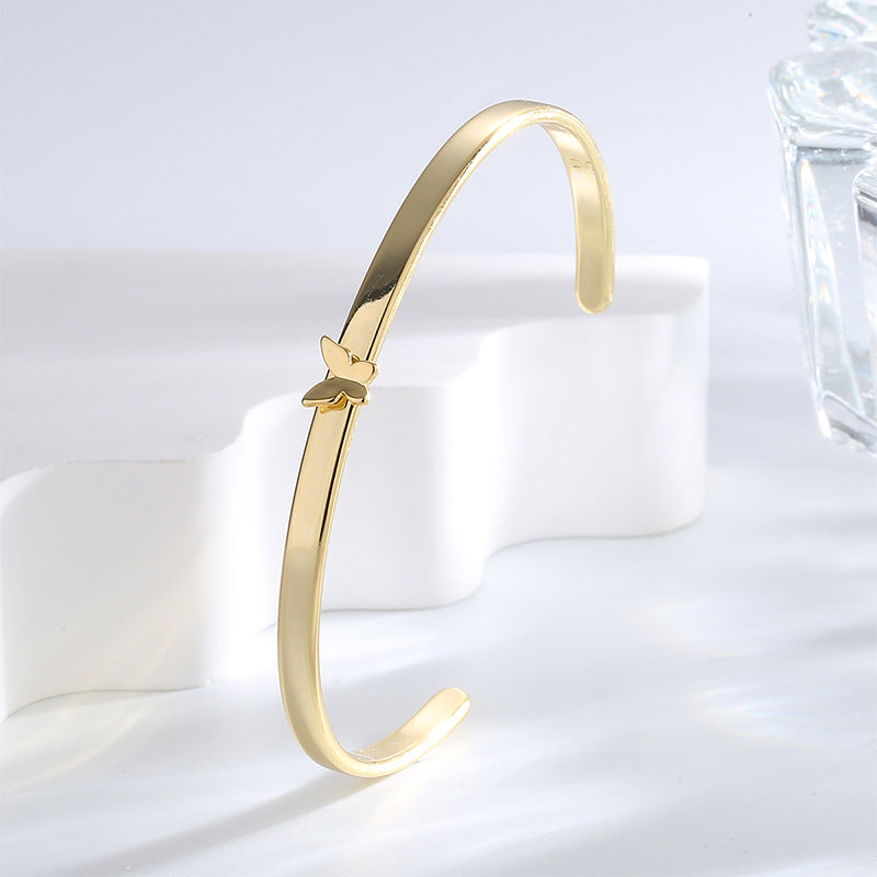 angled view of polished butterfly cuff bracelet