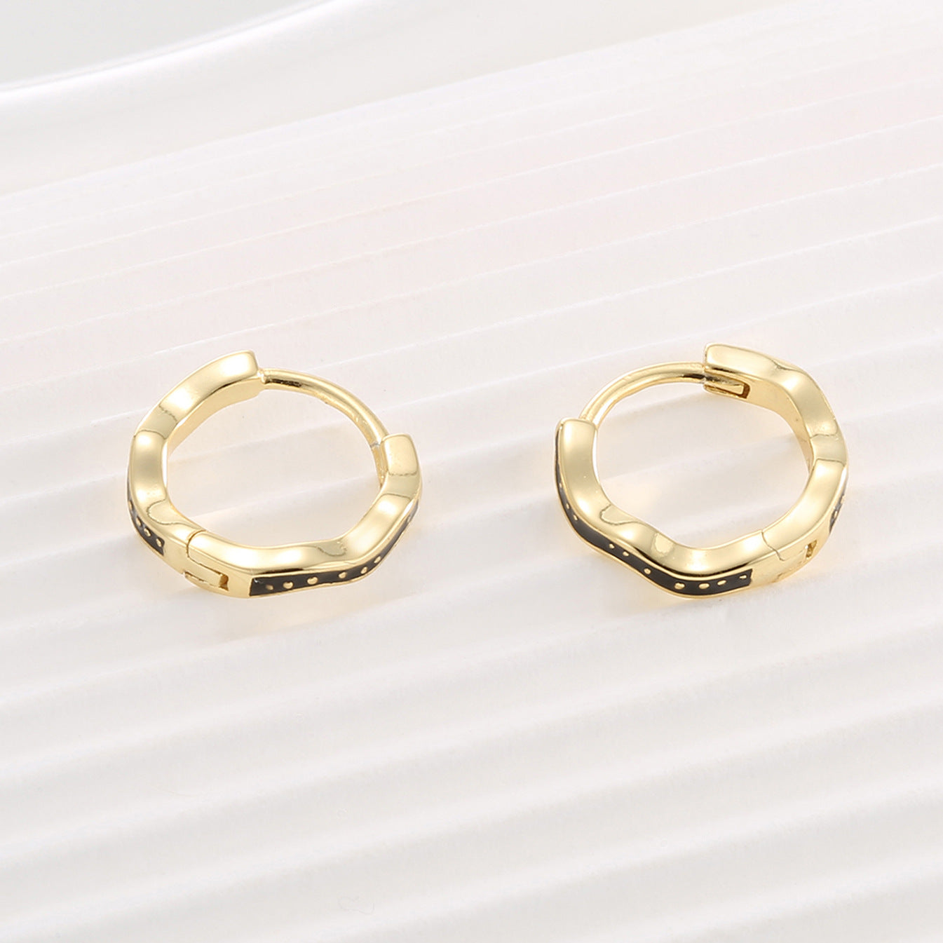 Gold Plated 925 Sterling Silver Black Resin Wave Hoop Earrings — smooth gold backs and hinges