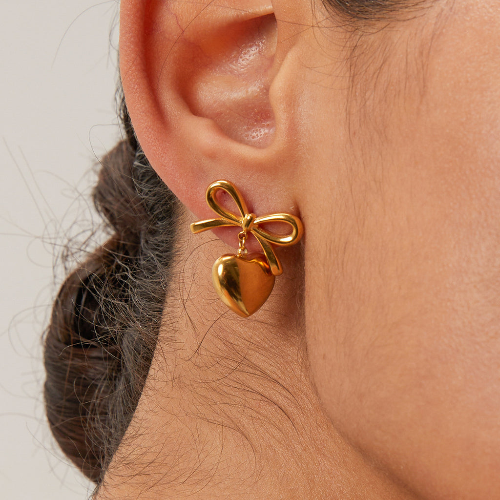 Stainless Steel Bow Heart Drop Earrings in Two Finishes – product view 1
