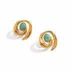 Open spiral stud earrings with green oval accents