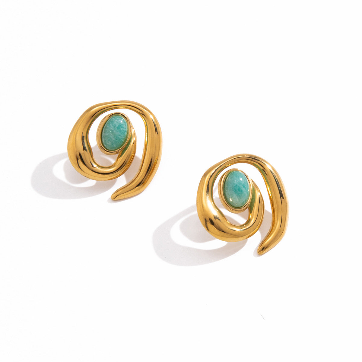Open spiral stud earrings with green oval accents
