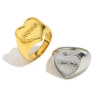 isolated gold and silver stainless steel mama signet rings