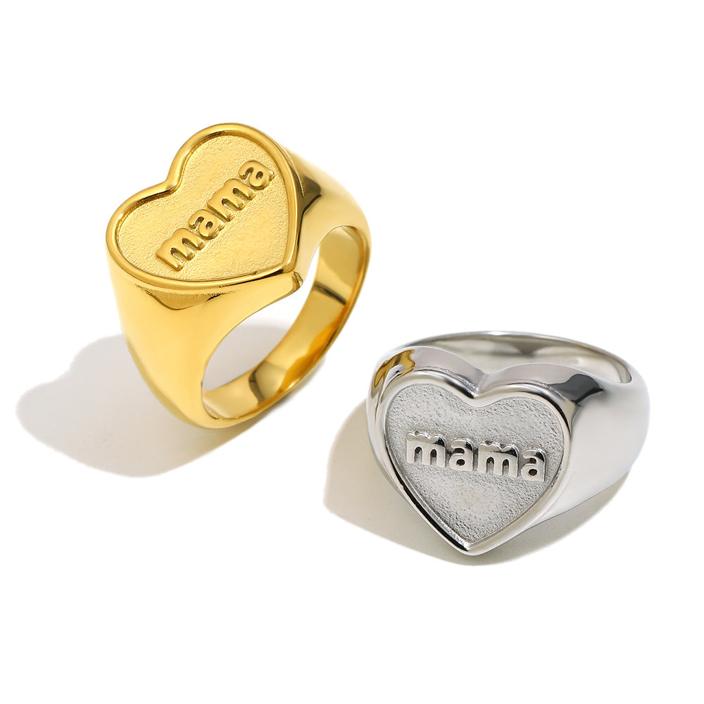 isolated gold and silver stainless steel mama signet rings