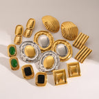 Statement stud assortment with black, green and metal accent designs