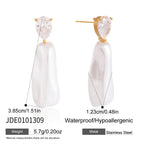 Elongated white drop earrings with size annotations