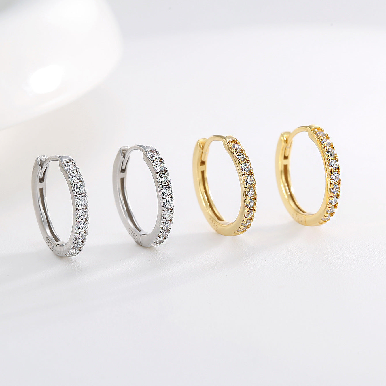925 Sterling Silver Pavé Zirconia Huggie Hoop Earrings — upright pairs in both finishes